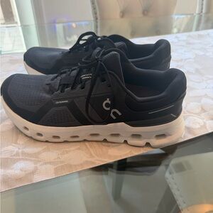 On Running Cloudrunner 2 Black and White Sneakers